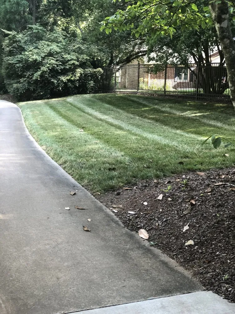 Trusted lawn mowing service for year-round maintenance in Charlotte, NC by BMW’s Landscaping and Lawn Maintenance