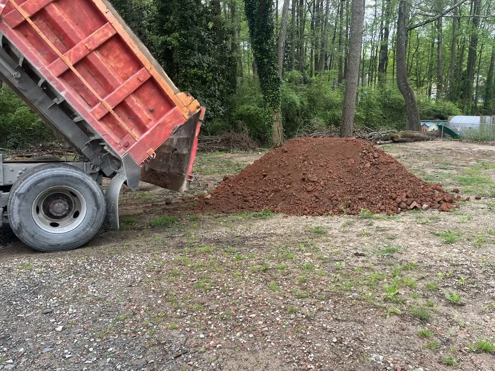 Affordable lawn care service for year-round maintenance across Snellville, GA - Bobcat services