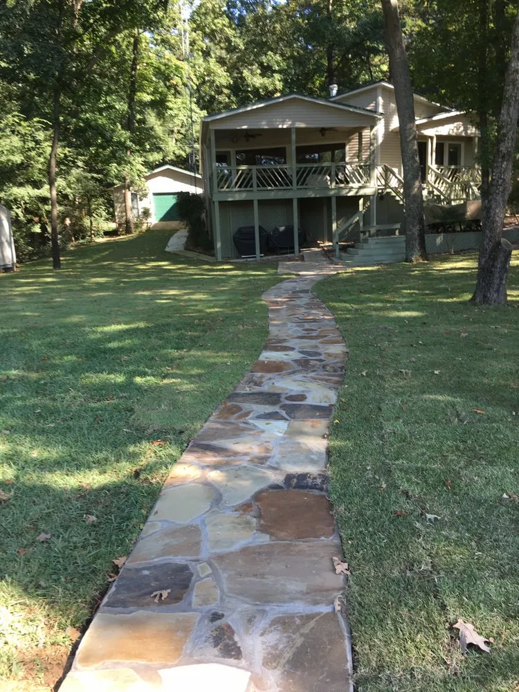 Custom residential landscaping for residential properties in Pittsburg, TX by Bobkat Landscape & Irrigation