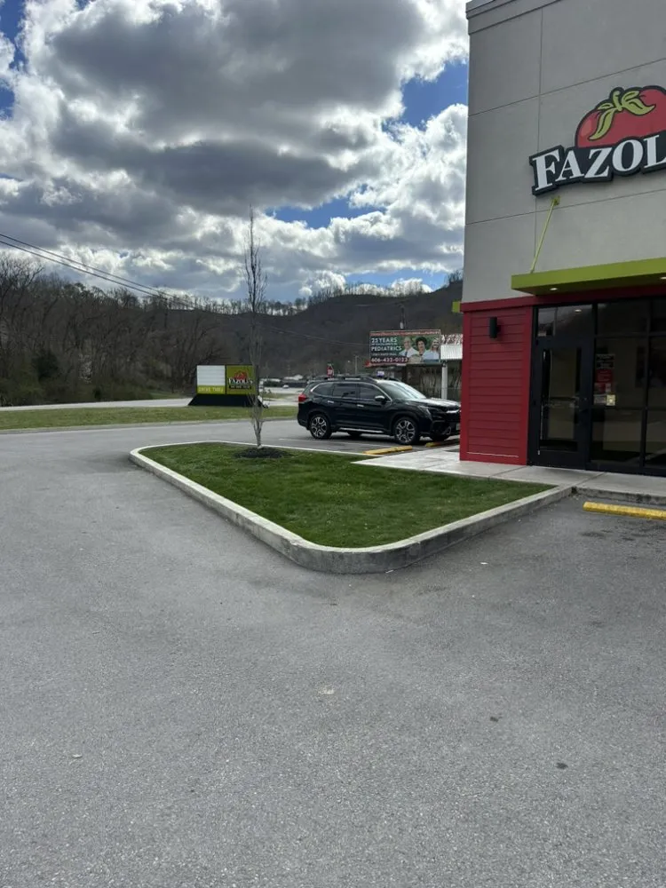 Professional outdoor landscaping with custom design in Canada, KY by Bogar Lawn Care