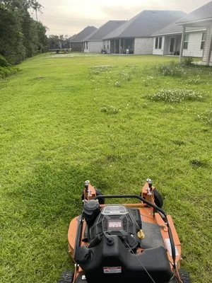 BOM Lawn Service Logo