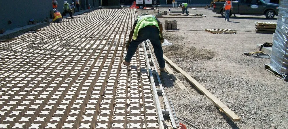 Expert landscape installation with custom design in El Paso, TX by Bomanite Artistic Concrete & Pools