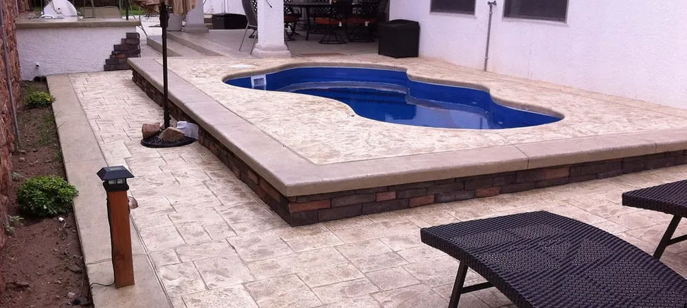 Top-rated lawn mowing service near you in El Paso, TX by Bomanite Artistic Concrete & Pools