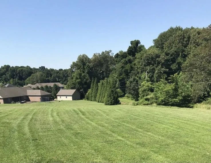 Professional lawn mowing service in Paducah, KY by Bone Yard Lawn Service