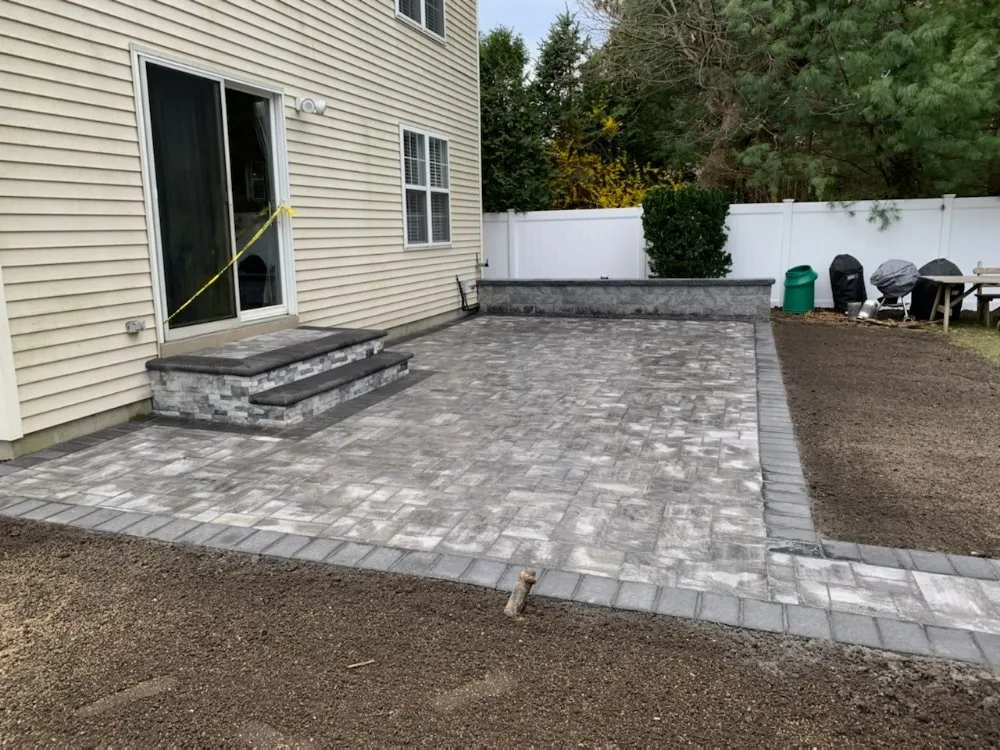 Reliable lawn mowing service for outdoor upgrades in East Northport, NY by Bongiorno's Contracting