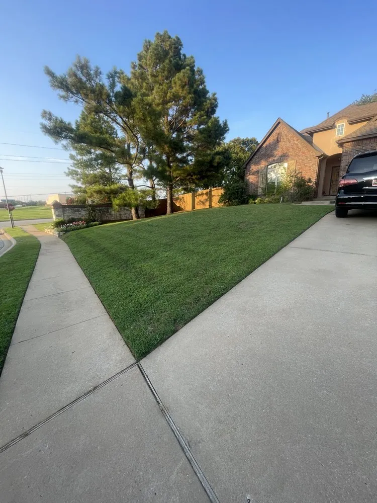 Affordable outdoor landscaping for beautiful yards in Tulsa, OK by Boomin' Greens Lawn Care