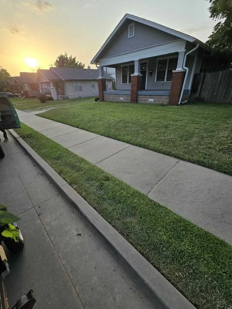 Top-rated lawn mowing service for beautiful yards in Tulsa, OK by Boomin' Greens Lawn Care