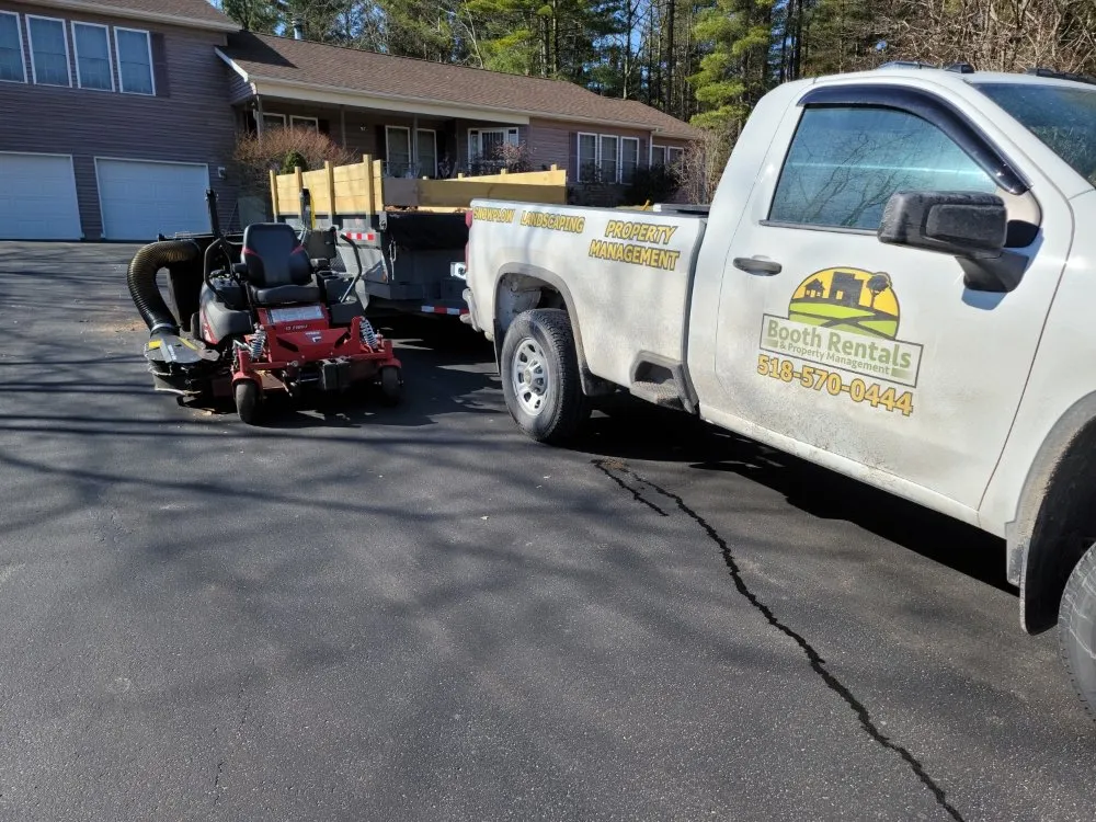 Professional lawn mowing service in Plattsburgh, NY by Booth Rentals & Property Management