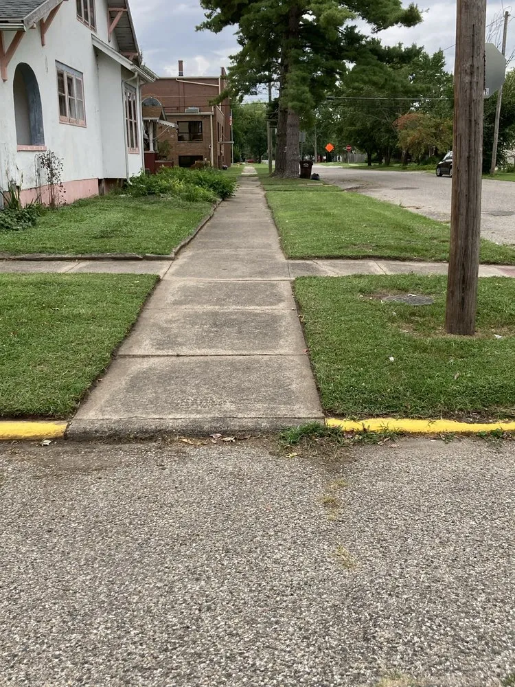 Custom yard cleanup service with custom design in Clinton, IN by Boots N Roots