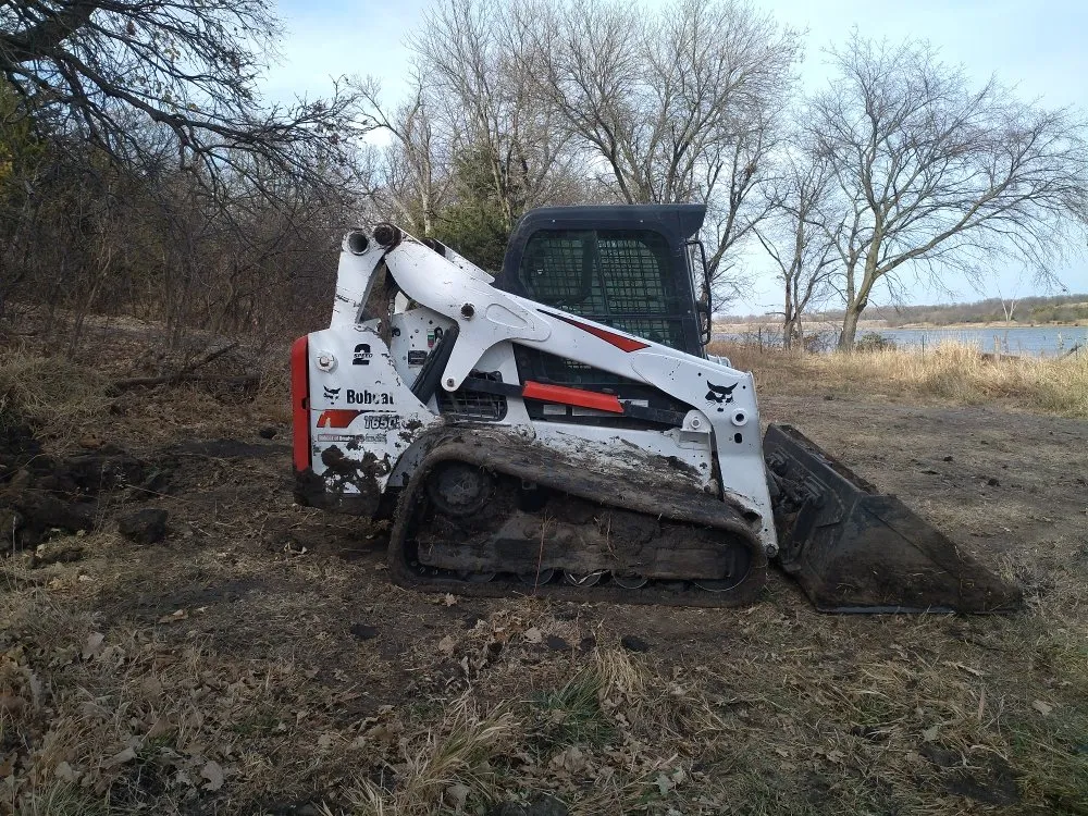 Top-rated lawn care service experts serving Tecumseh, NE - Borrenpohl Skid Steer