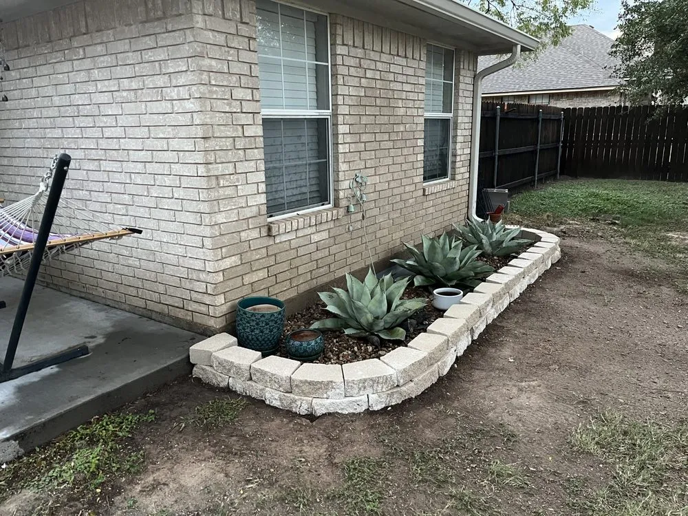 Expert lawn mowing service for residential properties in Waco, TX by Bosque Construction