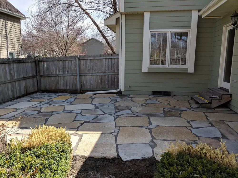 Reliable lawn care service in Johnston, IA by BOSS Complete Outdoor Solutions