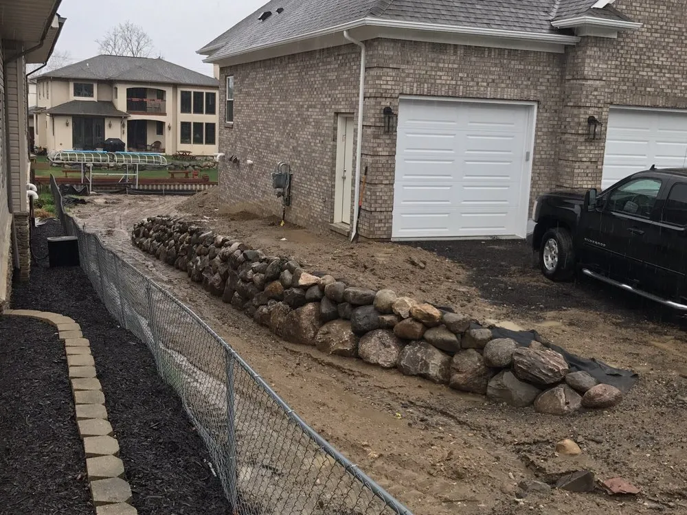 Professional lawn care service for residential properties in Waterford, MI by Boss Construction & Landscape Services