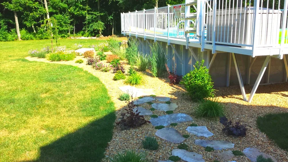 Affordable landscape installation for homes in Quinebaug, CT by BOSS Landscape Company