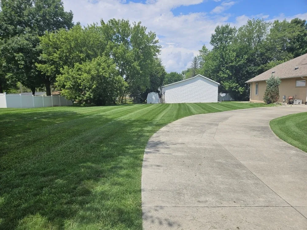 Expert outdoor landscaping for year-round maintenance in Flint, MI by Boss Lawn Care Service