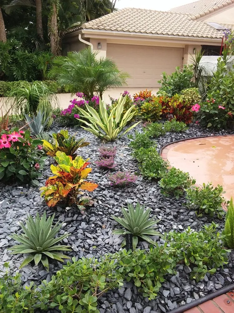 Professional landscape installation for year-round maintenance in Lake Worth, FL by Botanical Bruce & Co.