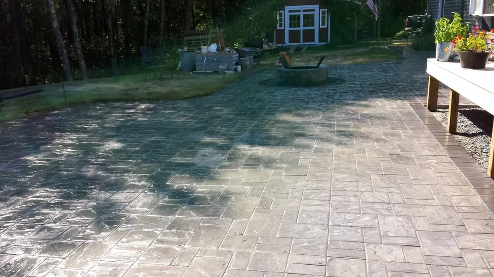 Custom lawn mowing service with custom design in Milford, MA by Boucher Landscaping