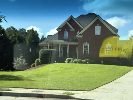 Bouie Brother's Landscaping Service Logo