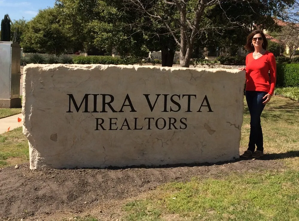 Professional yard cleanup service for year-round maintenance in Flower Mound, TX by Boulder Designs of DFW