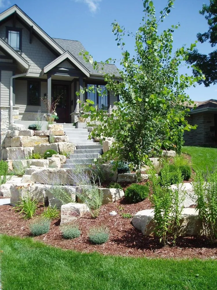Professional landscape installation for year-round maintenance in Rosemount, MN by Boulder Images