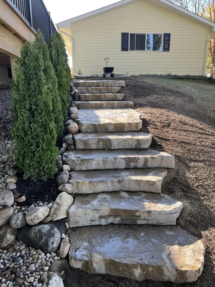 Affordable lawn mowing service for year-round maintenance across Schoolcraft, MI - Boulder Landscape Construction