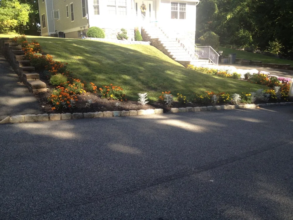 Reliable lawn mowing service with custom design in East Hanover, NJ by Box Brothers Landscaping, LLC