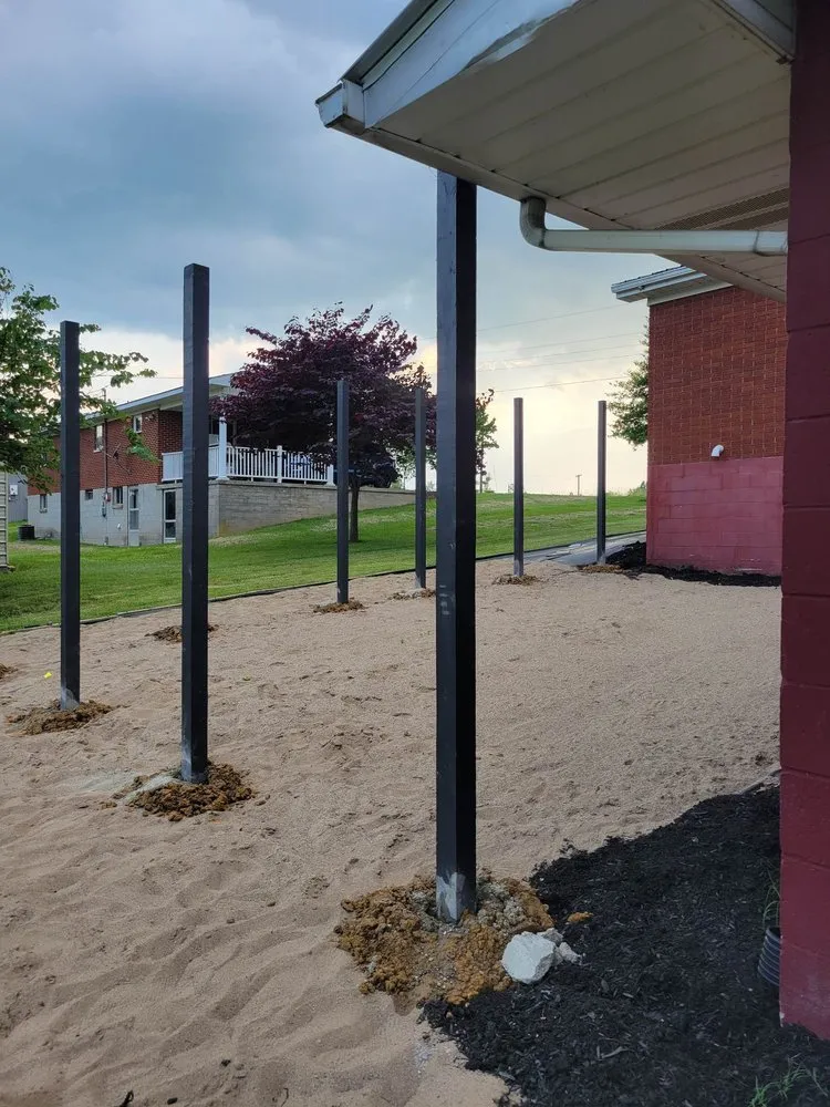 Custom landscape design for year-round maintenance in Russell Springs, KY by Bradens Lawncare