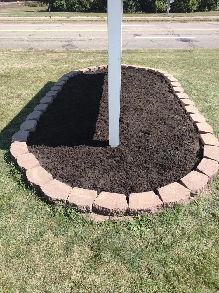 Professional outdoor landscaping for homes in Battle Creek, MI by Brad's Lawn Services