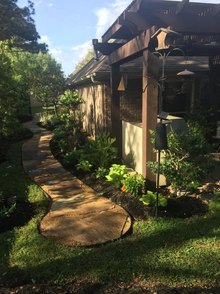 Custom residential landscaping in Houston, TX by Branchbusters Tree Service