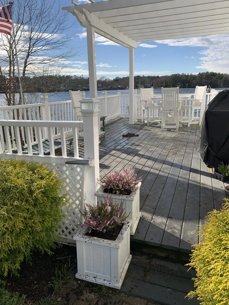 Professional lawn care service for year-round maintenance in Pembroke, MA by Brandon Landscaping