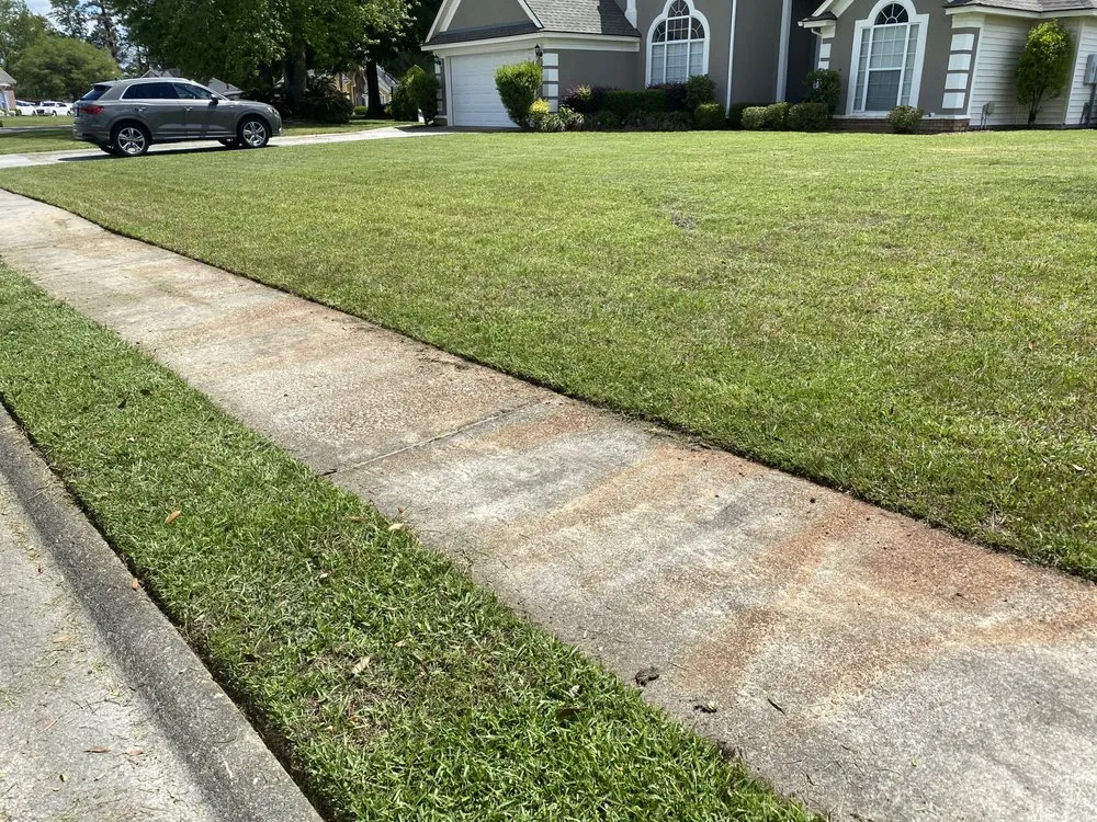 Custom lawn mowing service for residential properties in Pooler, GA by Brandon’s Lawn Care