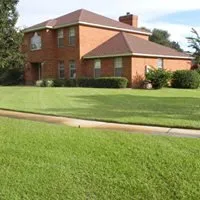 Professional yard cleanup service with custom design in Panama City, FL by Brandows Lawn & Landscape