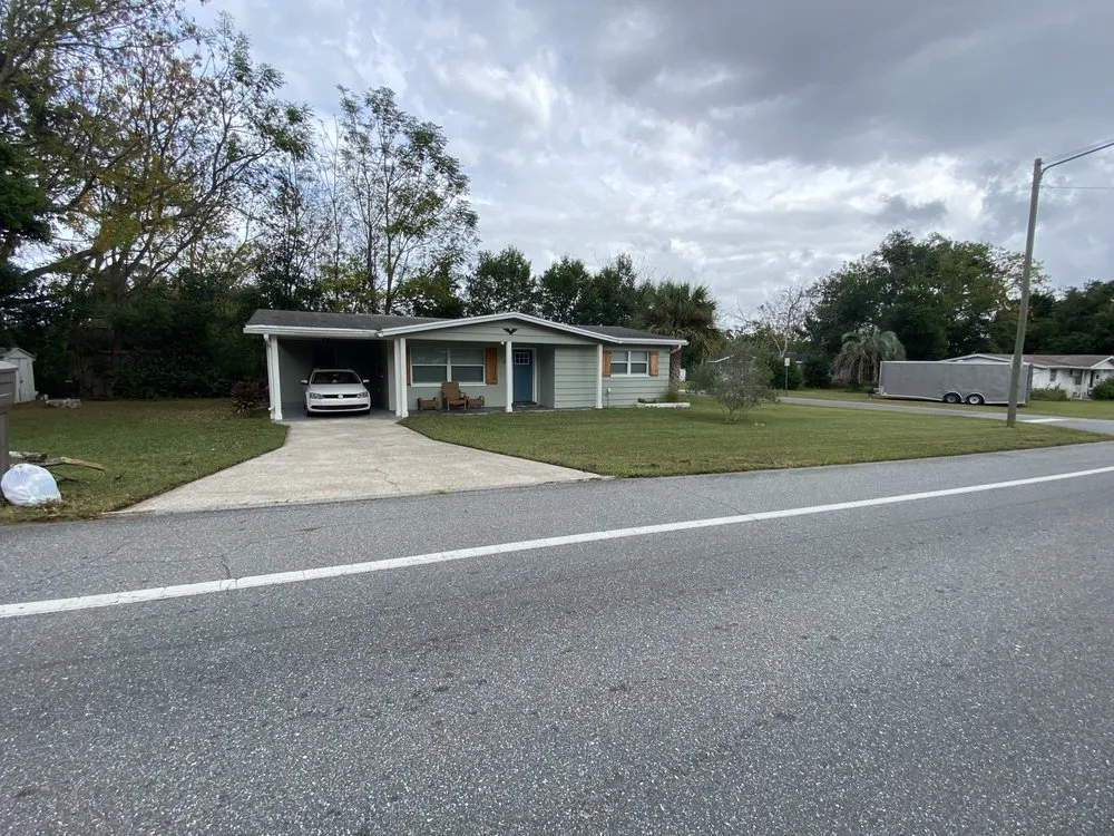 Custom garden landscaping in Inglis, FL by Branns Lawn Care