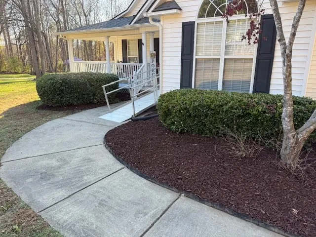 Expert lawn care service for residential properties in Clayton, NC by Branscome Landscaping