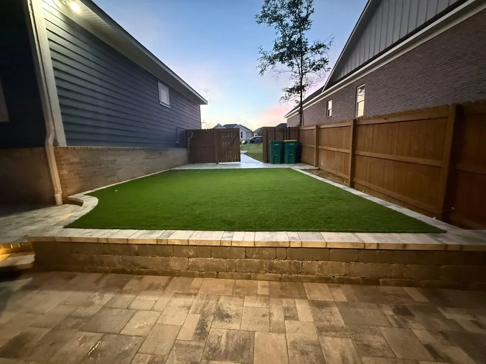 Custom lawn mowing service with custom design across Fort Walton Beach, FL - Brazilian Brickpavers