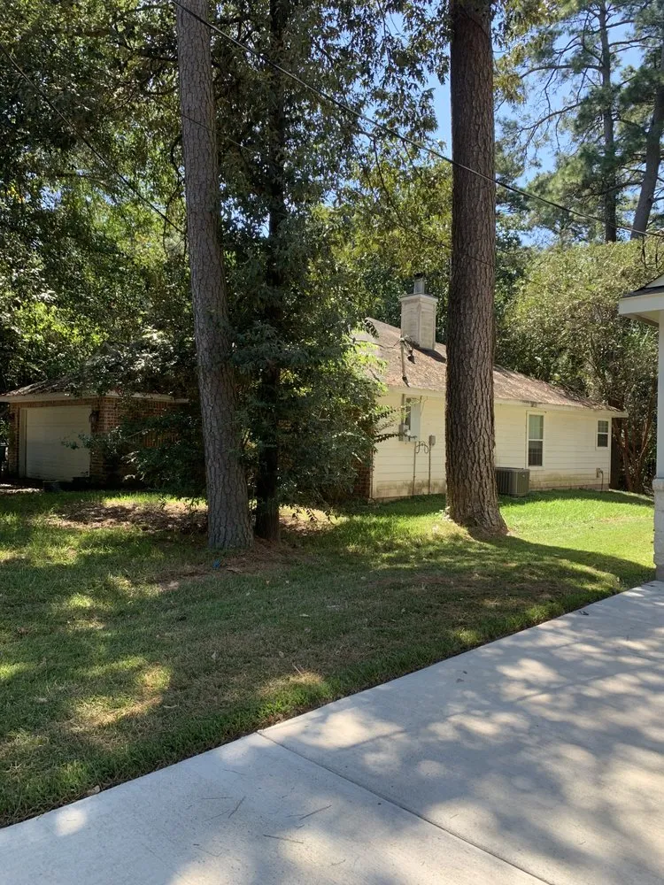 Custom landscape installation in Montgomery, TX by Breakthrough Arbor And Landscape