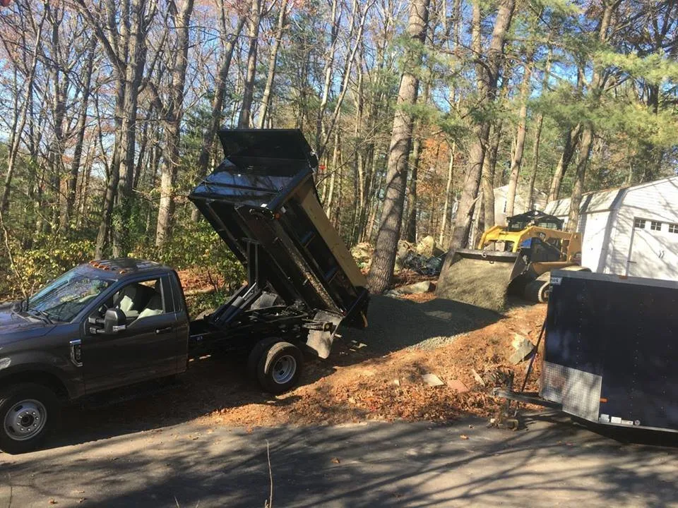 Custom landscape design for residential properties in Grafton, MA by Breault Construction