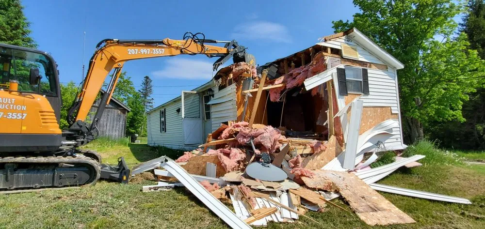 Professional yard cleanup service for residential properties across Monson, ME - Breault Construction