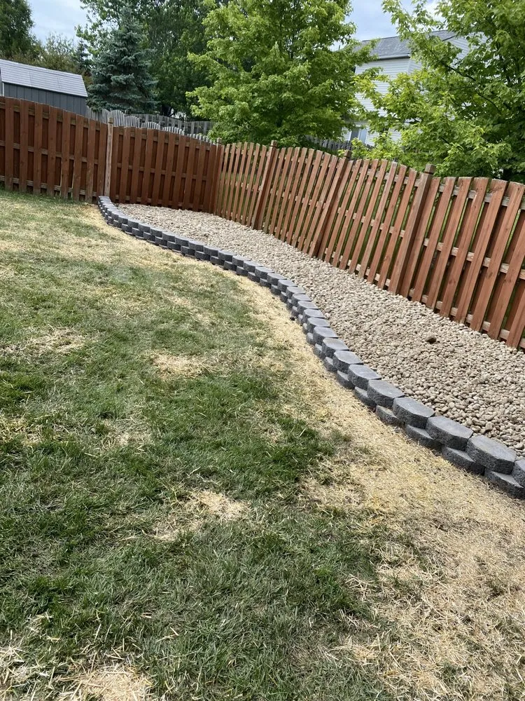 Expert lawn care service for year-round maintenance in Clinton, MI by Brendon Shankland