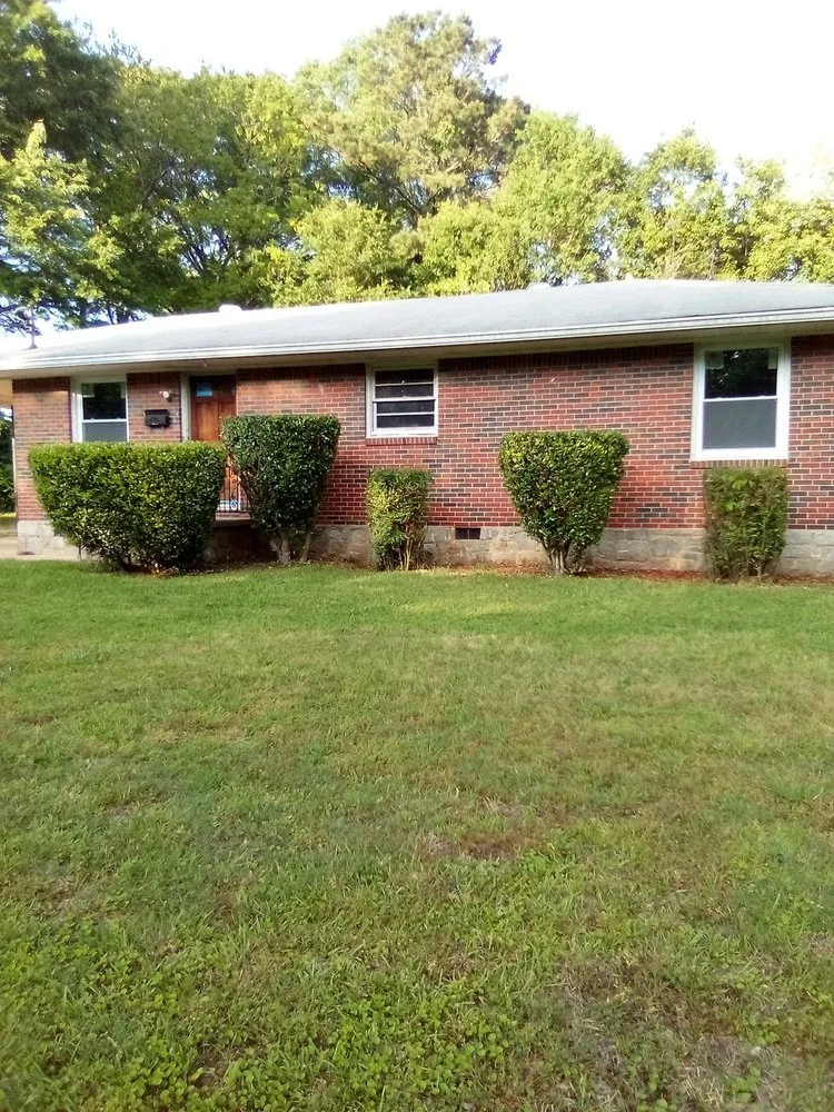 Professional lawn care service for year-round maintenance in Peachtree City, GA by Brent Landscaping Services