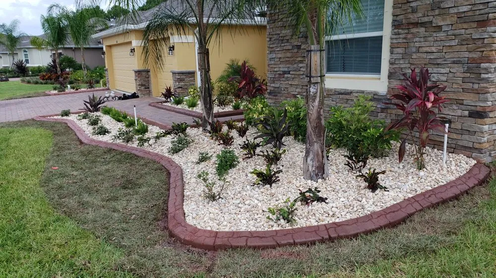 Custom landscape installation for residential properties in Palm Bay, FL by Brevard Landscaping