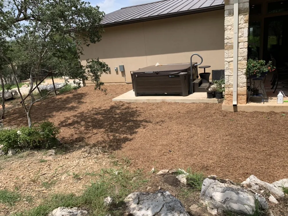 Affordable yard maintenance with custom design in New Braunfels, TX by Brewer Lawn Designs