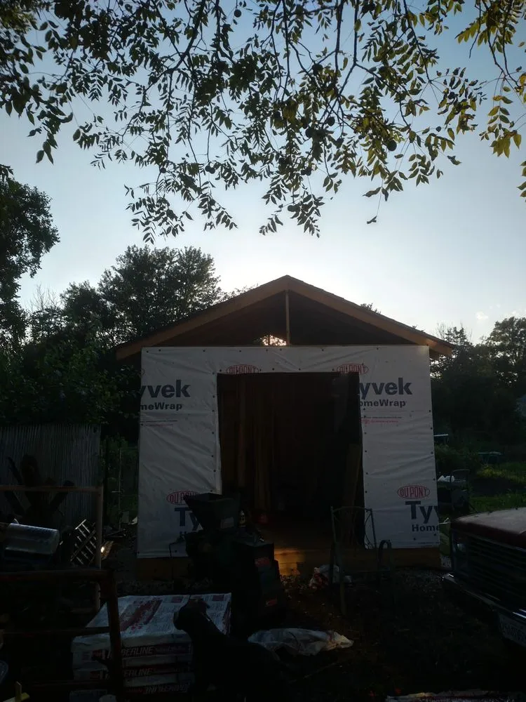 Custom landscape design for residential properties in Galesburg, IL by Brewtus Multi Services