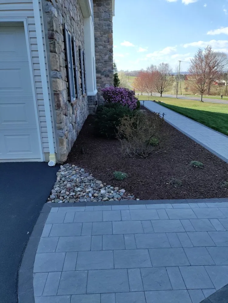Custom garden landscaping for year-round maintenance in Phillipsburg, NJ by Brian & Sons Groundskeeping & Construction