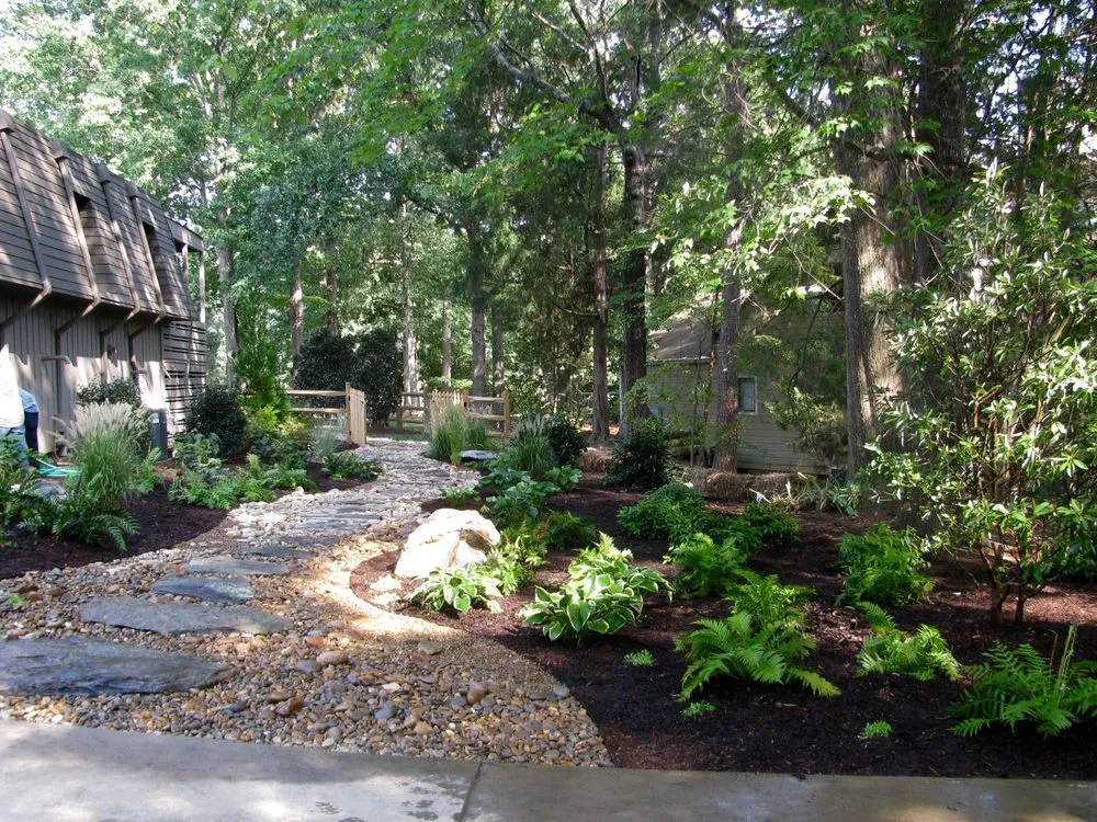 Custom lawn care service for year-round maintenance across Charlotte, NC - Brian Paradise Fine Gardens & Landscaping