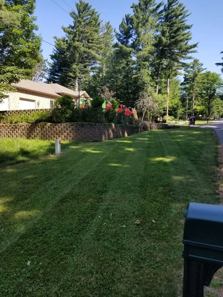 Expert lawn mowing service in Eagle River, WI by Brian's Fairway Look