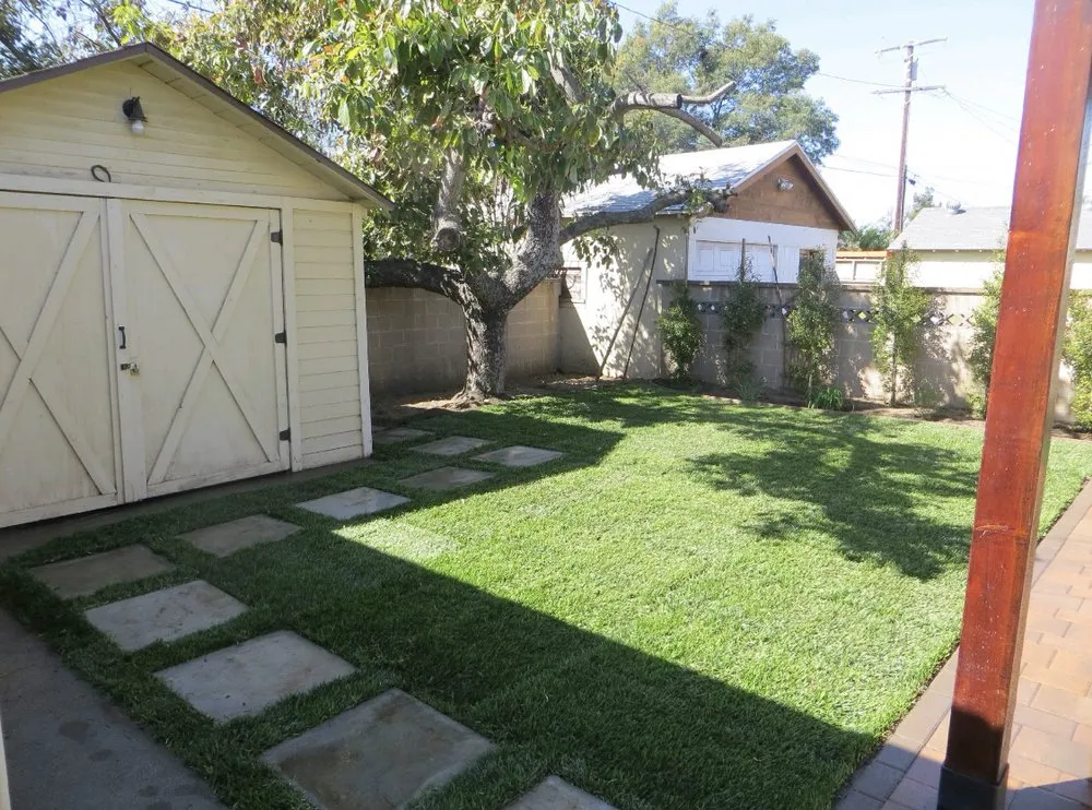 Custom landscape design for year-round maintenance in Olathe, KS by Brian's Landscaping & Junk Removal