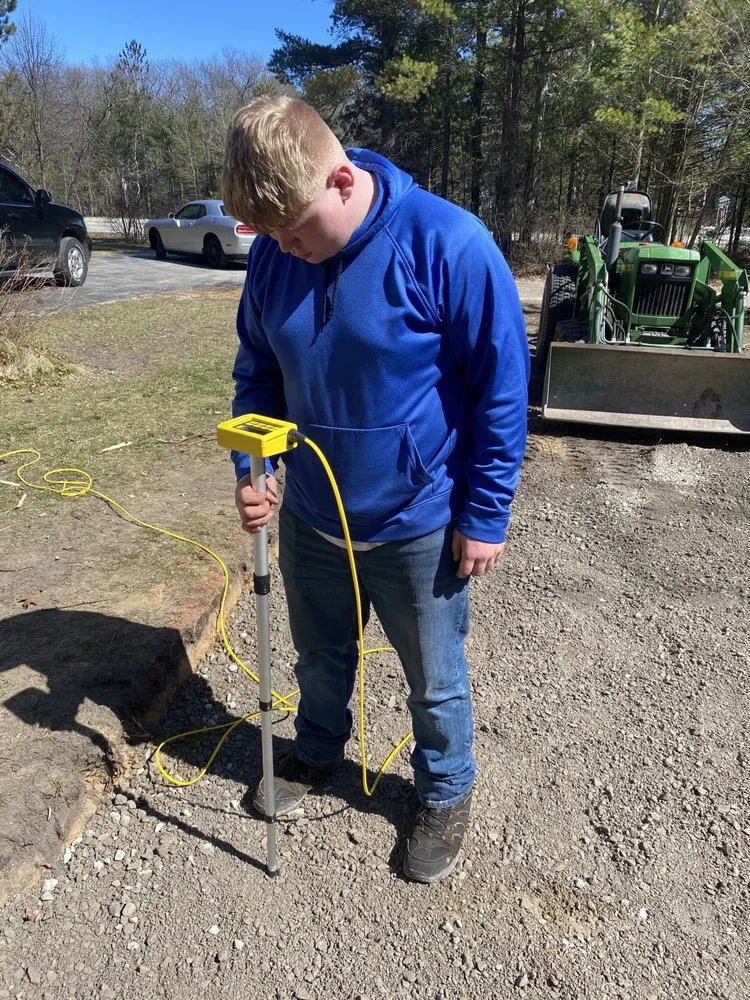 Professional yard maintenance for outdoor upgrades in Oscoda, MI by Brick & Boulder Landscaping