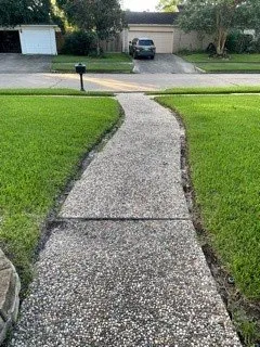 Trusted lawn mowing service for homes in Houston, TX by Bridge Point Services