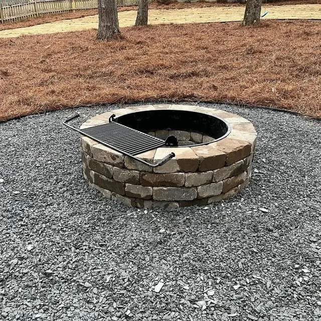 Custom yard maintenance with custom design in Loganville, GA by Bridges Elite Landscapes